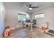 Comfortable bedroom or office with a ceiling fan and natural light at 1617 Cherokee Trl, Valrico, FL 33594