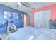 Spacious bedroom featuring colorful walls, ceiling fan and closet at 1617 Cherokee Trl, Valrico, FL 33594