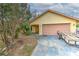 Charming single-story home features a two-car garage and well-maintained front yard at 1617 Cherokee Trl, Valrico, FL 33594