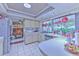 Charming kitchen featuring a breakfast bar and stainless steel appliances at 1617 Cherokee Trl, Valrico, FL 33594