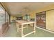 Large enclosed patio space offering plenty of natural light and room for various activities at 1617 Cherokee Trl, Valrico, FL 33594