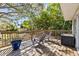 Relaxing outdoor space, featuring a wood deck with chairs perfect for enjoying the surrounding nature at 1653 S Prescott Ave, Clearwater, FL 33756