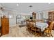 Formal dining room adjacent to kitchen, with view to living spaces at 1653 S Prescott Ave, Clearwater, FL 33756