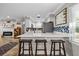 Eat-in kitchen features a breakfast bar with seating and modern finishes at 1653 S Prescott Ave, Clearwater, FL 33756