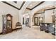 Grand foyer showcasing high ceilings, arched doorways, and marble floors at 17005 Madres De Avila, Tampa, FL 33613