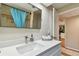 Bright bathroom with a shower/tub combination and a modern sink at 1887 Oak Forest E Dr, Clearwater, FL 33759