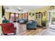 Bright living room with comfortable seating, stylish decor, and natural light at 1887 Oak Forest E Dr, Clearwater, FL 33759
