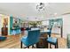 Open floor plan seamlessly connects the kitchen, dining area, and living space at 1887 Oak Forest E Dr, Clearwater, FL 33759