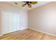 Bedroom with wood floor and closet at 19200 Weymouth Dr, Land O Lakes, FL 34638