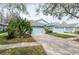 Charming single-story home with a well-manicured lawn and a two-car garage at 19200 Weymouth Dr, Land O Lakes, FL 34638