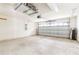 Spacious two-car garage with automatic door at 19200 Weymouth Dr, Land O Lakes, FL 34638