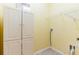 Laundry room with ample storage space and convenient shelving at 19200 Weymouth Dr, Land O Lakes, FL 34638