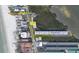 Aerial view showing proximity of the home to the beach and local shopping at 19829 Gulf Blvd # 601, Indian Shores, FL 33785
