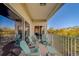 Relaxing balcony with multiple seating options and view of surrounding landscape at 19829 Gulf Blvd # 601, Indian Shores, FL 33785