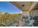 Relaxing balcony with multiple chairs and tables, perfect for enjoying the beautiful view at 19829 Gulf Blvd # 601, Indian Shores, FL 33785