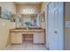 Bathroom featuring double sinks, granite countertops, and natural lighting at 19829 Gulf Blvd # 601, Indian Shores, FL 33785