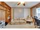Charming bedroom with a murphy bed, bookshelf, and comfortable sitting area, perfect for relaxation at 2007 E View Dr, Sun City Center, FL 33573