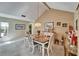 Dining area with vaulted ceilings and a cozy, inviting atmosphere, perfect for gatherings at 2007 E View Dr, Sun City Center, FL 33573