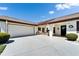 This home boasts an attached two car garage, a sunny front patio, and charming curb appeal at 2007 E View Dr, Sun City Center, FL 33573