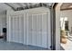 Garage interior features clean doors for additional storage at 2007 E View Dr, Sun City Center, FL 33573