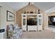Comfortable sitting area with built-in shelving and bright airy feel at 2007 E View Dr, Sun City Center, FL 33573