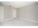 Bedroom featuring marble floors, a door, a window, and a closet at 2254 Sequoia Dr, Clearwater, FL 33763