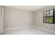 Bedroom featuring marble floors, a window and a closet at 2254 Sequoia Dr, Clearwater, FL 33763