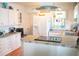 Well-lit kitchen featuring ample counter space, modern appliances, and charming decorative accents at 2501 Emerson S Ave, St Petersburg, FL 33712
