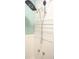 Modern shower with a rain shower head, handheld sprayer, and classic white paneled walls at 2501 Emerson S Ave, St Petersburg, FL 33712