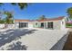 Beautifully landscaped backyard features modern hardscaping and mature landscaping at 2650 E Vina Del Mar Blvd, St Pete Beach, FL 33706