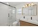 Modern bathroom with glass shower, updated vanity with modern fixtures, and bright lighting at 2650 E Vina Del Mar Blvd, St Pete Beach, FL 33706