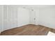 Bedroom with hardwood floors, a double door closet and recessed lighting at 2650 E Vina Del Mar Blvd, St Pete Beach, FL 33706