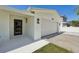 Charming single-story home featuring an attached garage, and an inviting front entrance at 2650 E Vina Del Mar Blvd, St Pete Beach, FL 33706