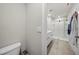 Clean bathroom with walk-in glass shower, white vanity, and modern fixtures at 2760 Scarlet Bay Pl, Brandon, FL 33510