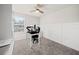 Bedroom area with carpeted floors and white wainscotting along the lower part of the wall at 2760 Scarlet Bay Pl, Brandon, FL 33510