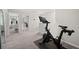 Upstairs exercise area with stationary bike and neutral paint at 2760 Scarlet Bay Pl, Brandon, FL 33510