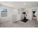 Upstairs exercise area with stationary bike, neutral paint, and natural light at 2760 Scarlet Bay Pl, Brandon, FL 33510