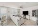 Inviting living room with a ceiling fan, entertainment center, and tile floors at 2760 Scarlet Bay Pl, Brandon, FL 33510