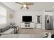 Comfortable living room featuring a ceiling fan and neutral tones at 2760 Scarlet Bay Pl, Brandon, FL 33510