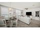 Open-concept living and dining area with neutral tones and tile flooring at 2760 Scarlet Bay Pl, Brandon, FL 33510