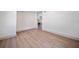 The basement features wood-look floors, neutral paint, and bright natural light at 2930 W Arch St, Tampa, FL 33607