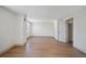 Bright, airy bedroom featuring sleek wood floors, neutral walls, a window, and a closet at 2930 W Arch St, Tampa, FL 33607