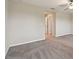 Bedroom with light-colored carpet and view through the doorway at 3629 Bellmeade Ct, Wesley Chapel, FL 33543