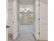 This is a bedroom with carpeting and view through the door at 3629 Bellmeade Ct, Wesley Chapel, FL 33543
