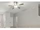 This is a room with light-colored walls and a ceiling fan at 3629 Bellmeade Ct, Wesley Chapel, FL 33543