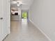 Open floor plan featuring tile floors and access to the outdoor patio at 3629 Bellmeade Ct, Wesley Chapel, FL 33543