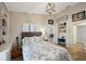 Bedroom featuring a workstation area and a view of a home's interior at 3994 Belmoor Dr, Palm Harbor, FL 34685