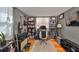 Well-organized office space featuring hardwood floors, built-in bookshelves, and ample workspace for productivity and creativity at 4509 10Th N Ave, St Petersburg, FL 33713
