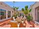Beautiful patio area surrounded by lush tropical greenery, ideal for outdoor dining and entertaining at 4509 10Th N Ave, St Petersburg, FL 33713
