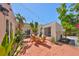 Inviting patio area featuring comfortable seating and lush tropical landscaping, perfect for relaxation at 4509 10Th N Ave, St Petersburg, FL 33713